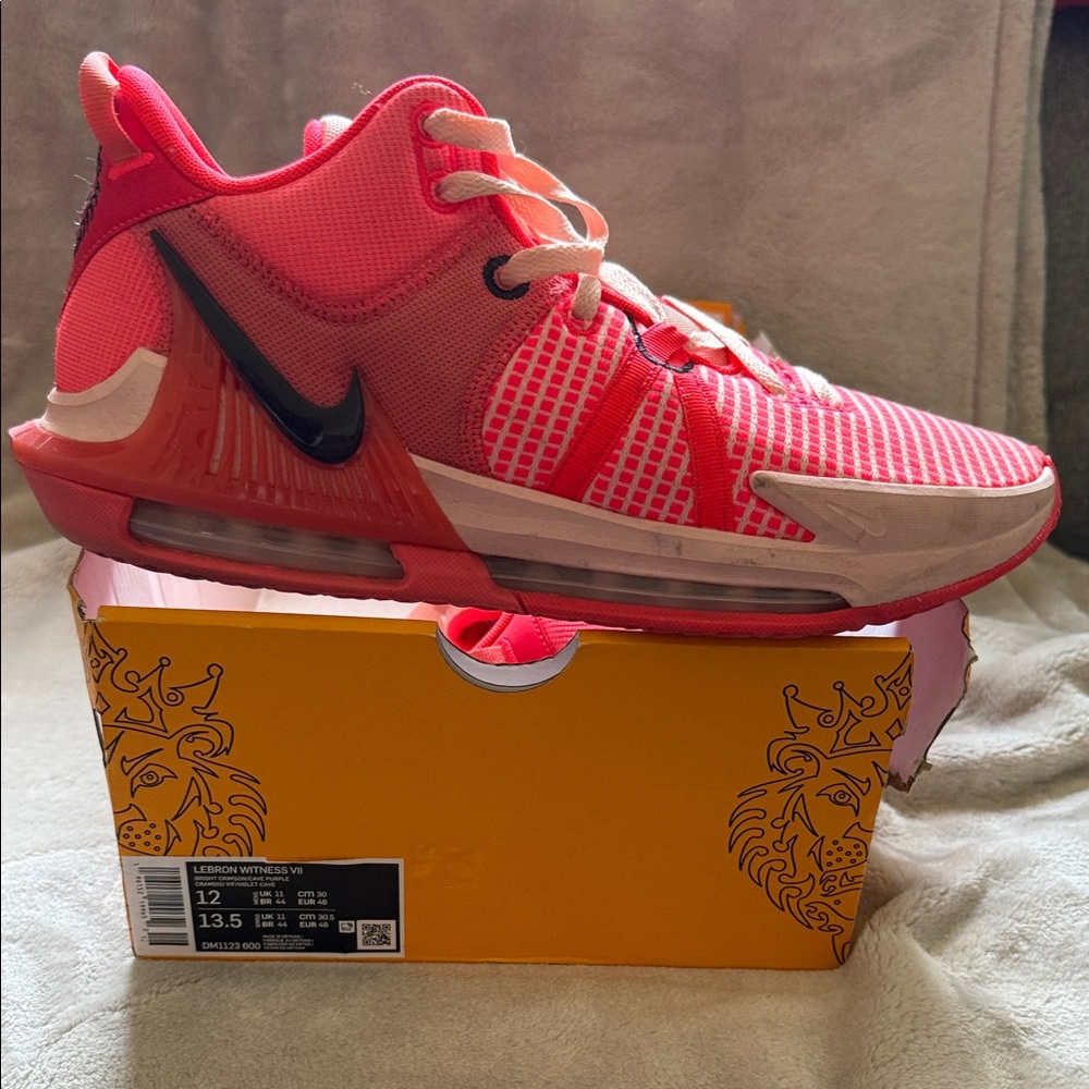 Nike Men’s Legend Witness VI Coral Sneakers.